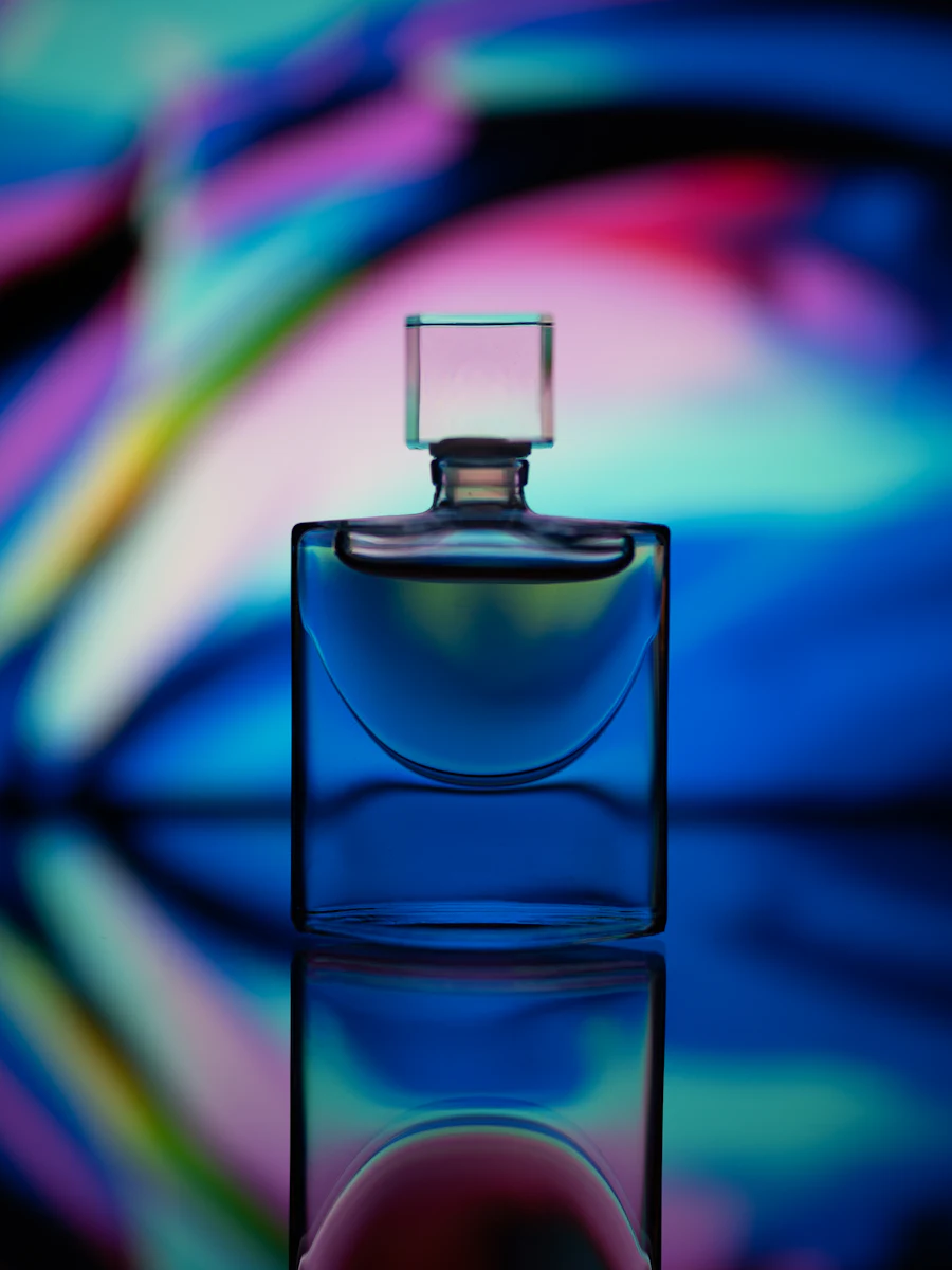 A glass perfume bottle catching the light