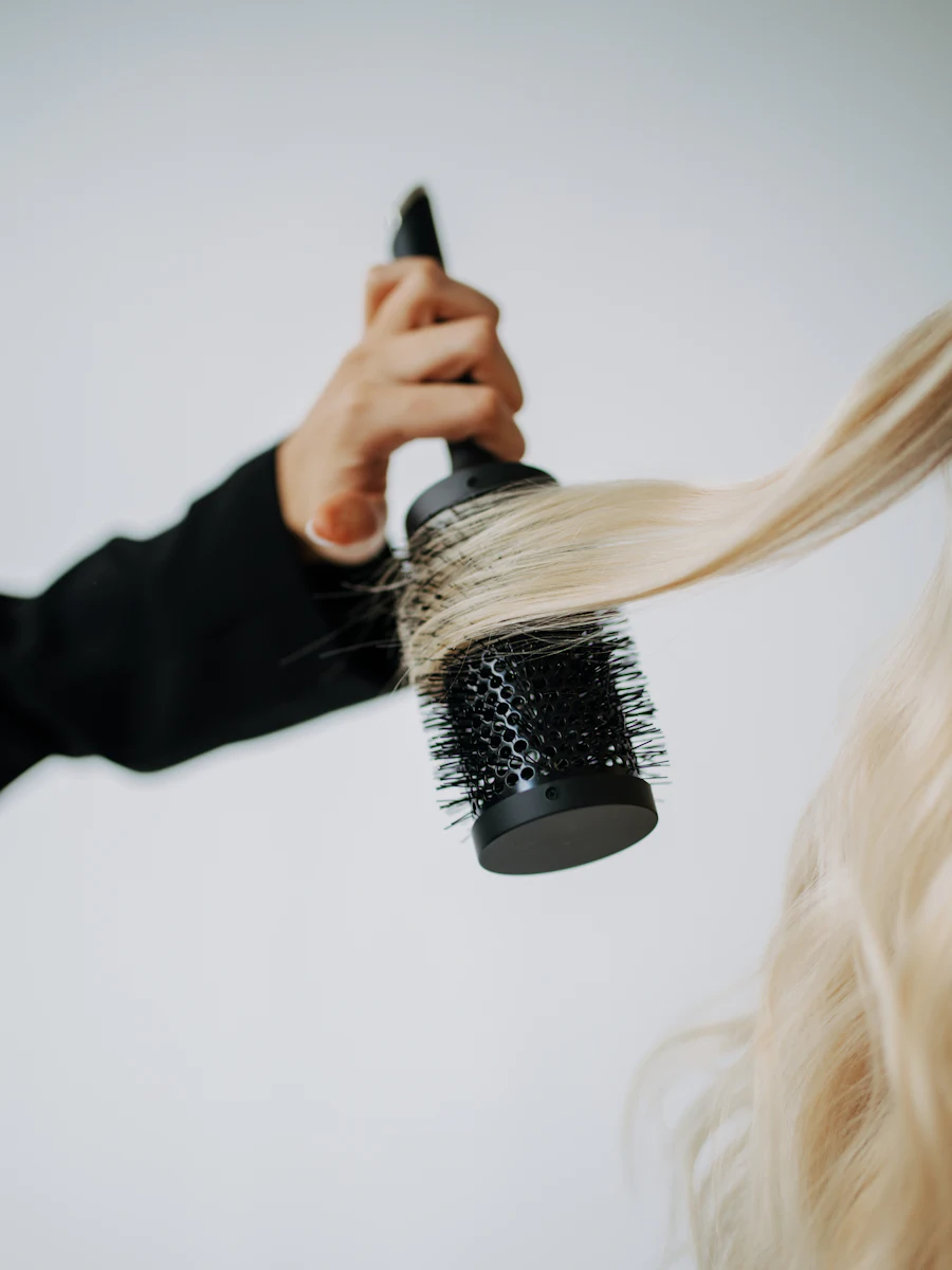 Styling long hair with a round brush