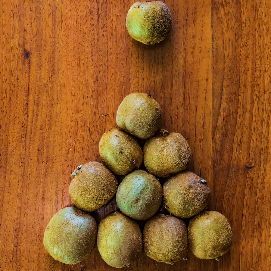 Tamarind pods on a wooden table