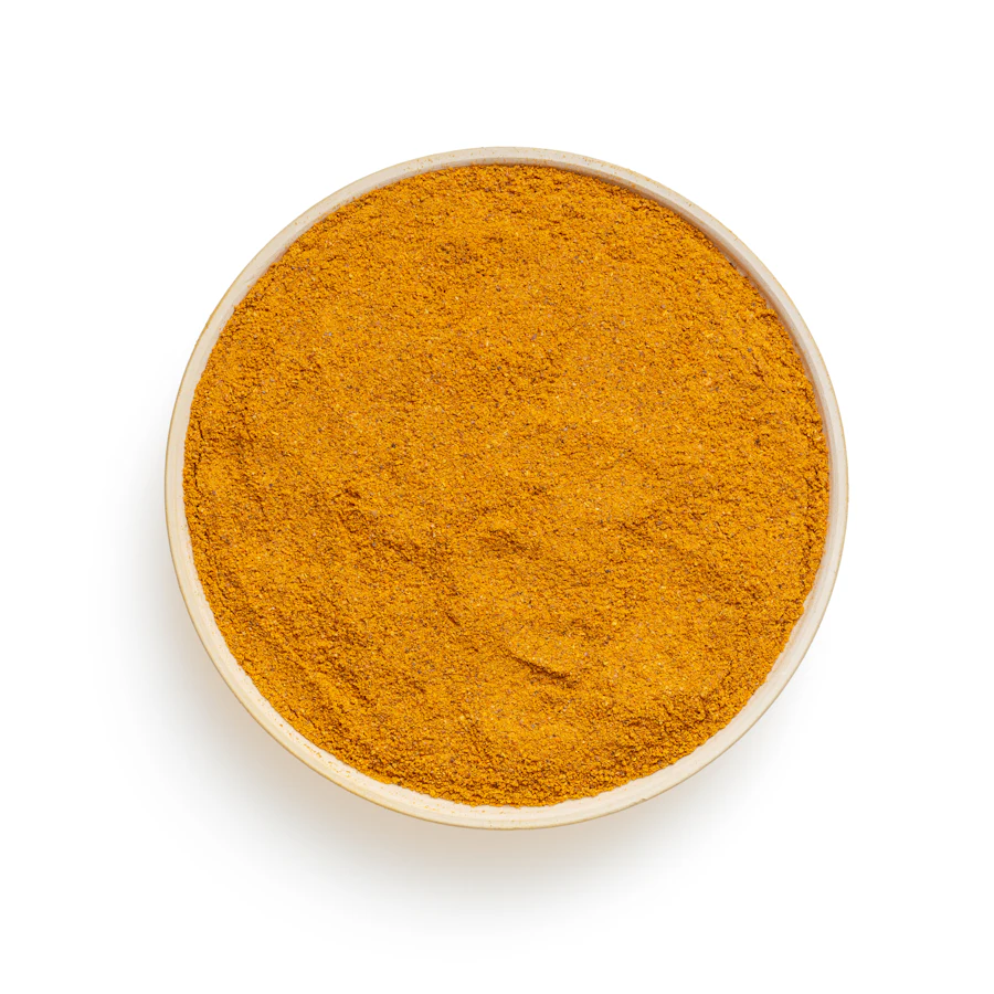 A bowl of ground turmeric