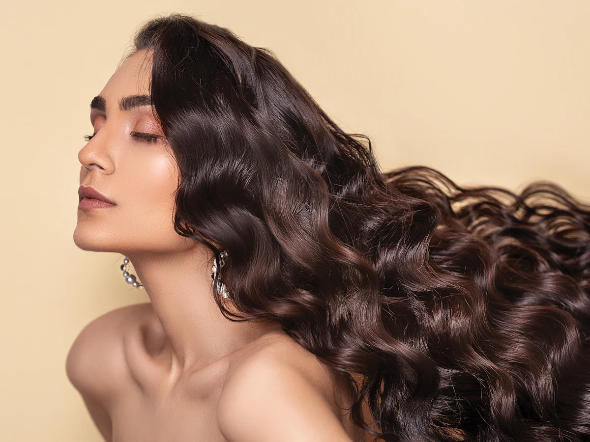 Long, glossy, healthy-looking wavy hair