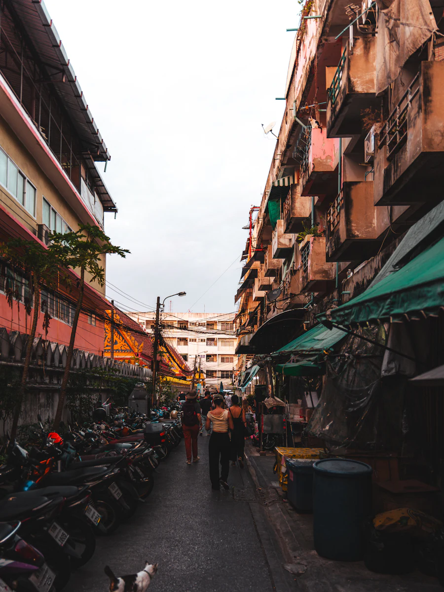 A busy lane of stalls on a Bangkok market weekend